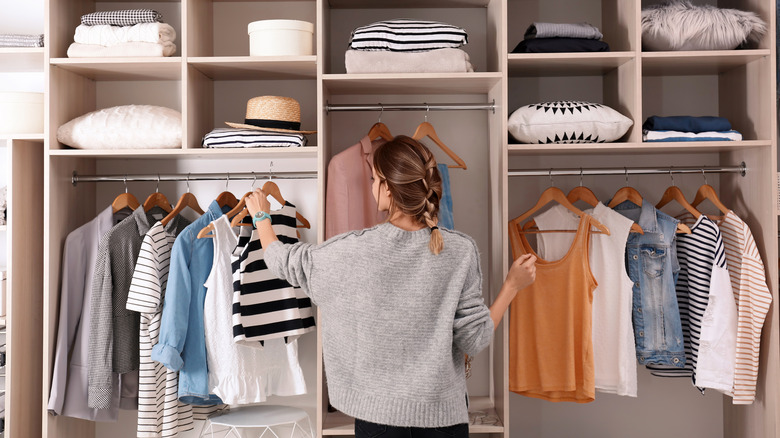 Woman looking in her wardrobe