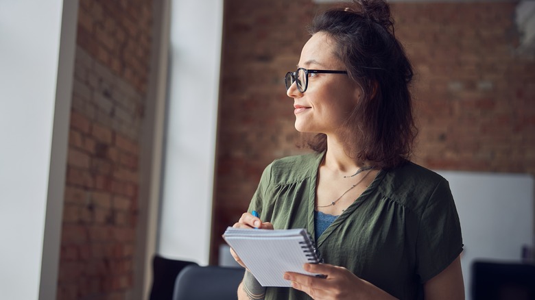 Woman taking notes 