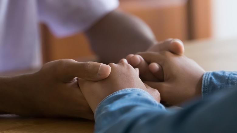 hands holding hands