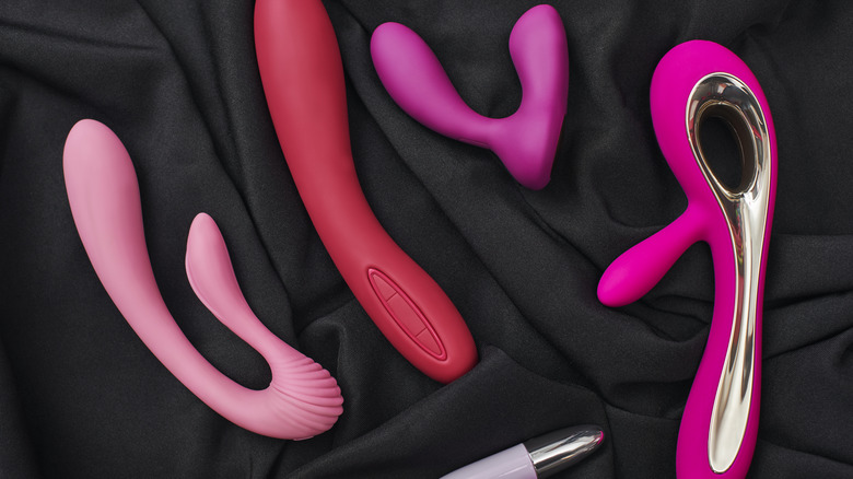 Holding sex toys