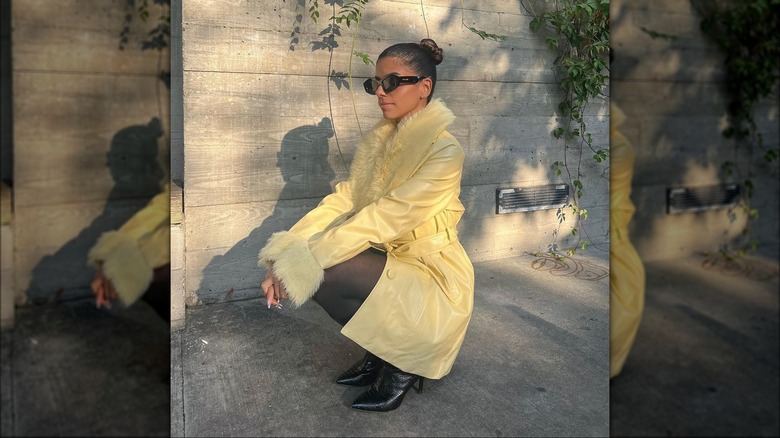 Woman in yellow coat