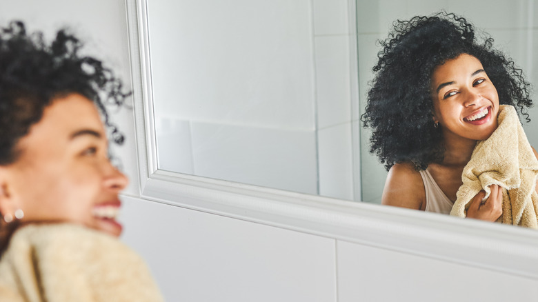 woman washing face