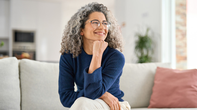 Older woman with gray hair smiling