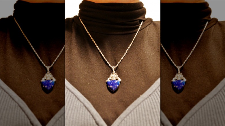 Locket against turtleneck