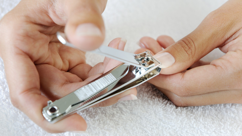 Person cutting nails