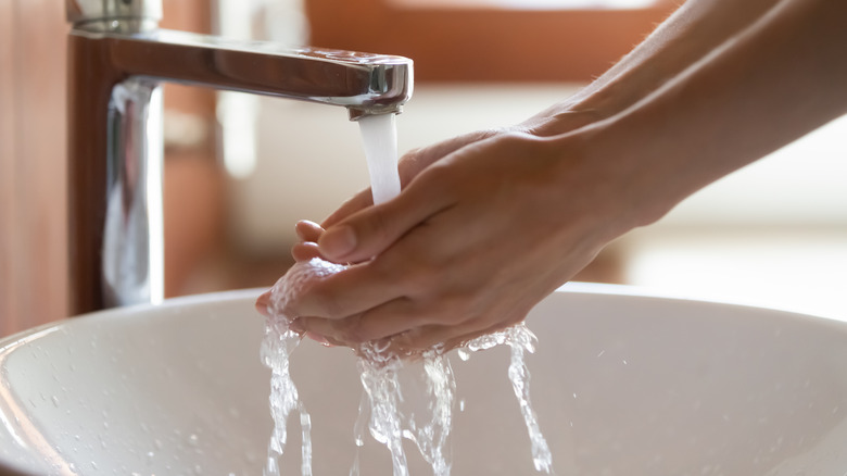 woman washing hands