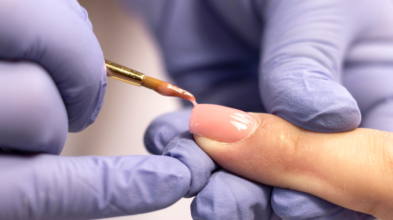nail being polished