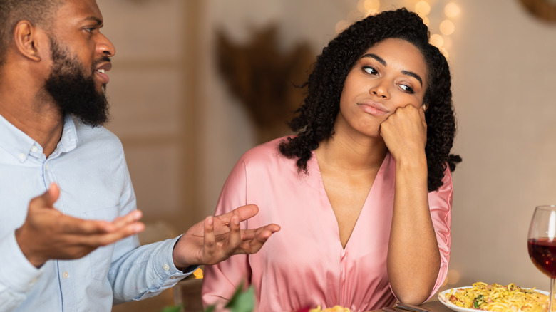 woman annoyed on a date