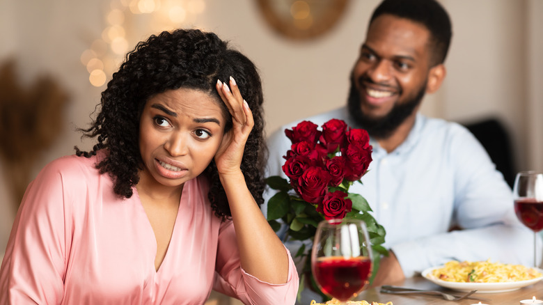 Woman having awkward date