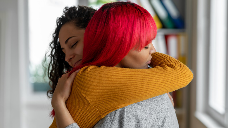 Friends hugging each other