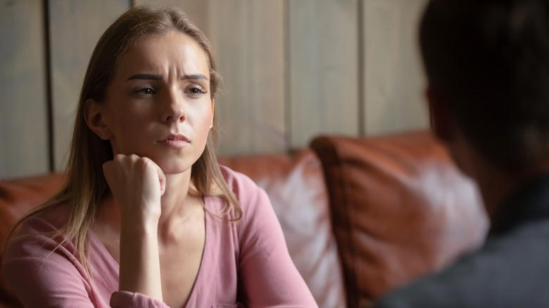 Two people in serious conversation