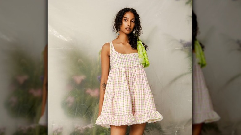 Woman in babydoll dress