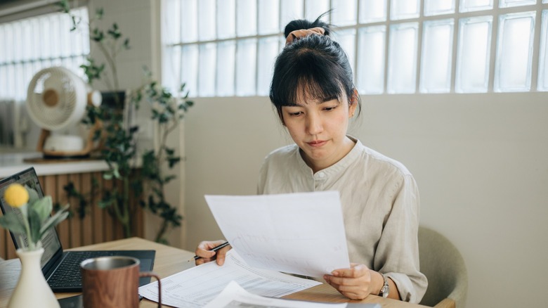 Woman reviewing documents