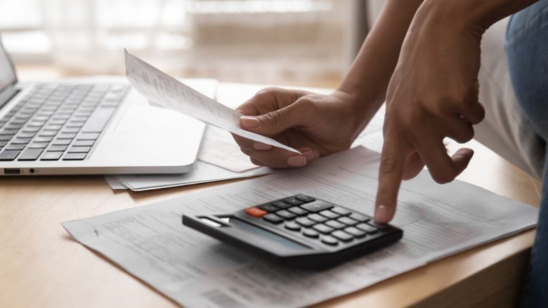 Woman paying bills