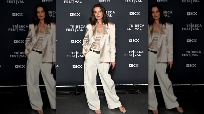 Katie Holmes in a cream colored suit in June 2026