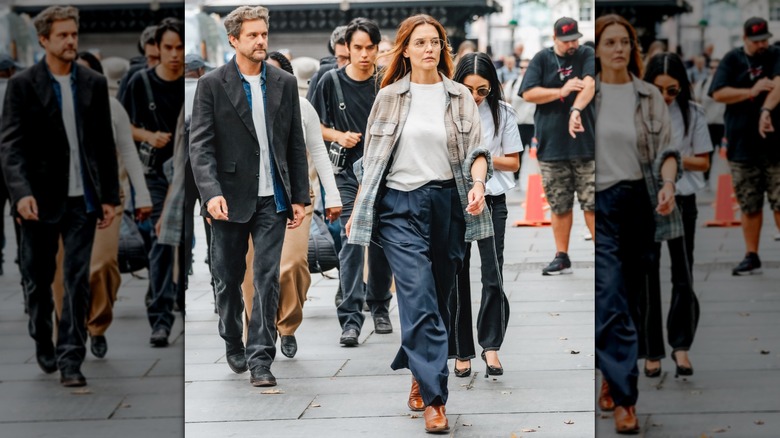 Katie Holmes walking in New York City in blue pants