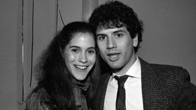 Black and white photo showing Jami Gertz with John Caliri in 1983