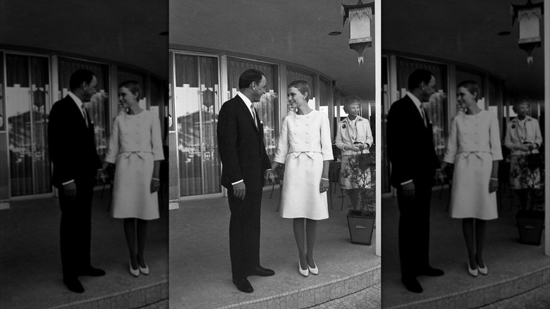 Black-and-white photo of Frank Sinatra and Mia Farrow on their wedding day