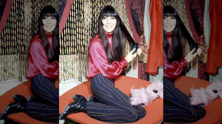 Cher brushing her hair in 1968