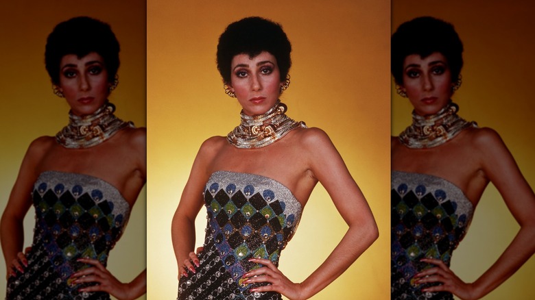 Cher with a short curly hair style 1975