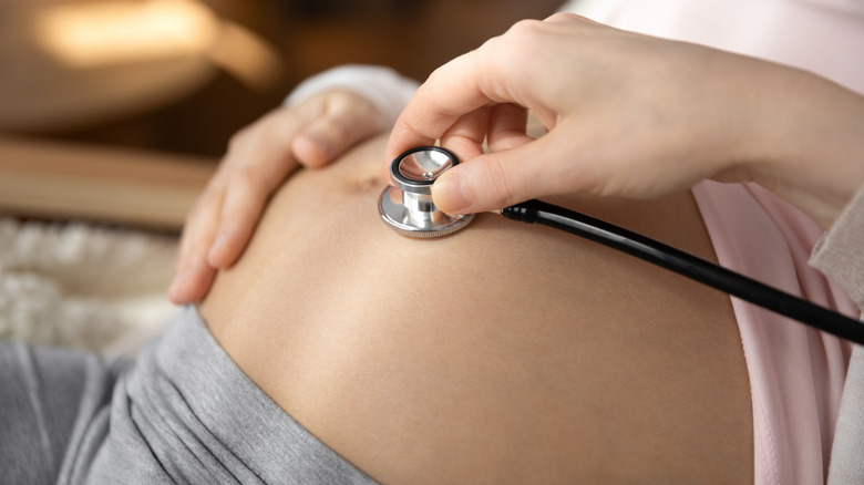 Doctor holding stethoscope