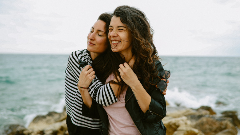Two women hugging 