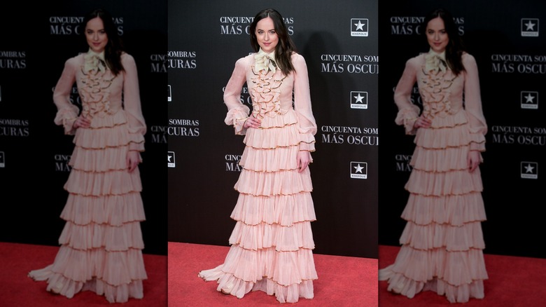 Dakota Johnson wearing a frilly gown at the Madrid premiere of "Fifty Shades Darker"