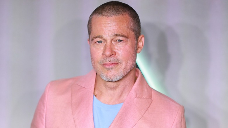 Brad Pitt with a neutral expression