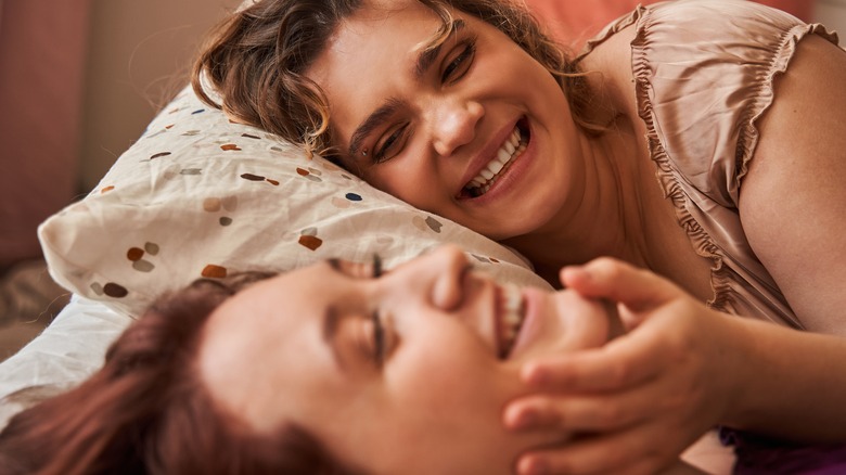 Lesbian couple in bed