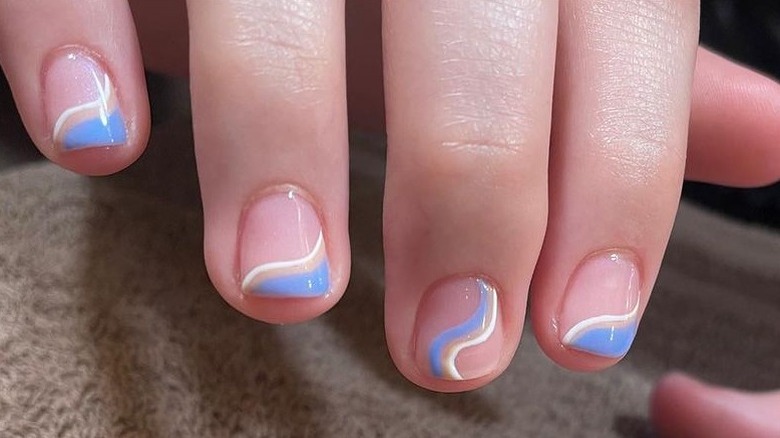 Blue and white swirl nails