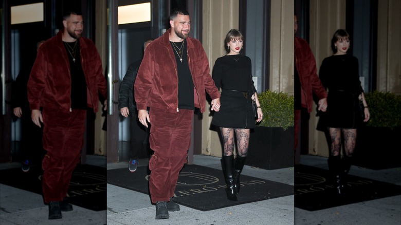 A paparazzi shot of Taylor Swift walking with Travis Kelce