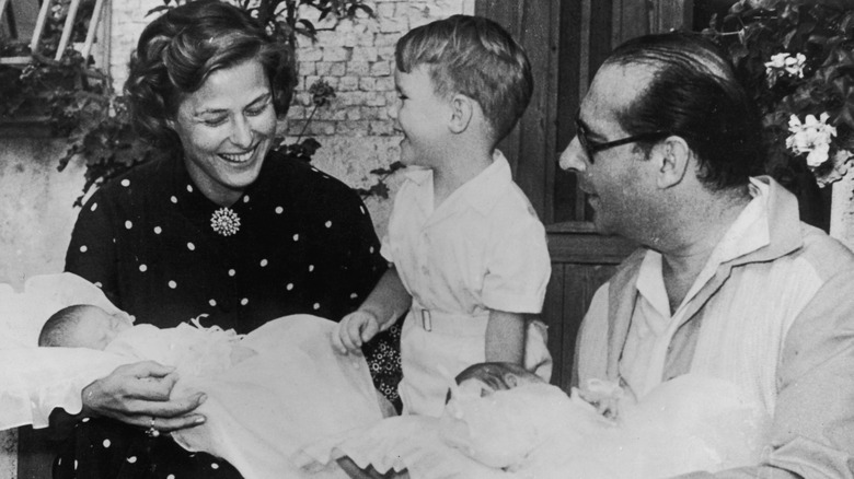 Black-and-white photo showing Ingrid Bergman and Roberto Rossellini with their children in 1952