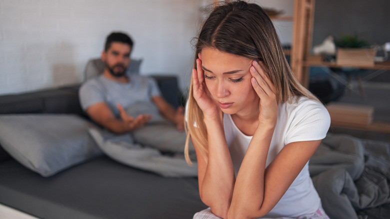 Couple fighting at bedtime