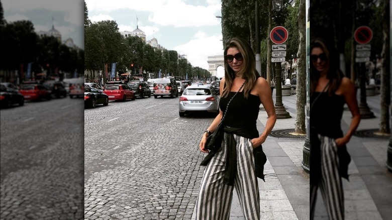 Woman with sweater around waist