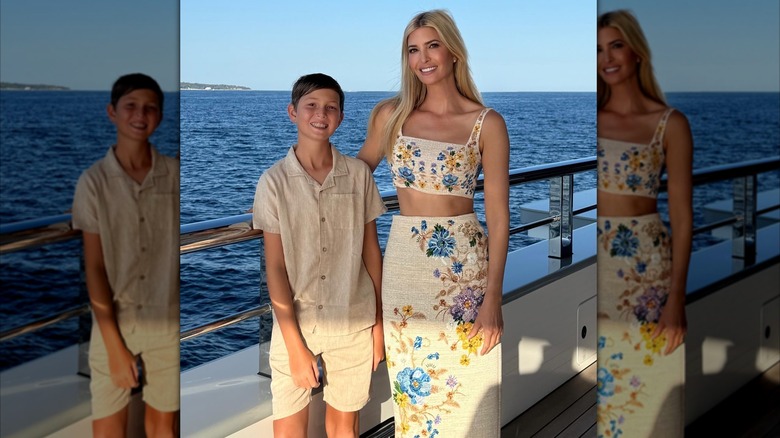 Ivanka Trump poses for a photo with one of her children on a yacht