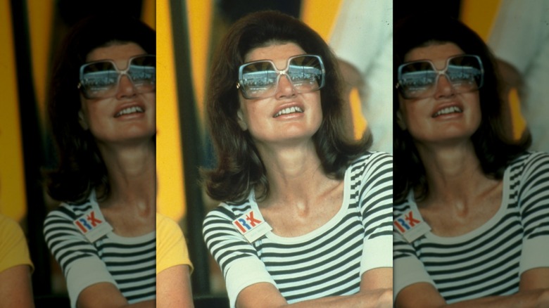Jackie Kennedy at Flushing Meadows Park in a blue and white striped shirt