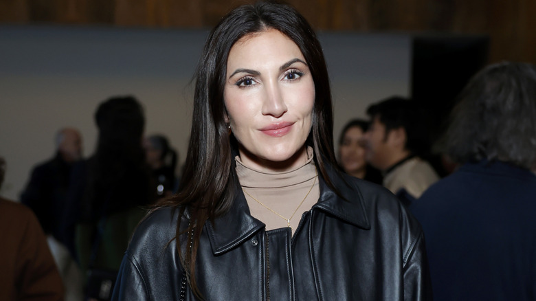 Jackie Sandler smiles at an event in 2024