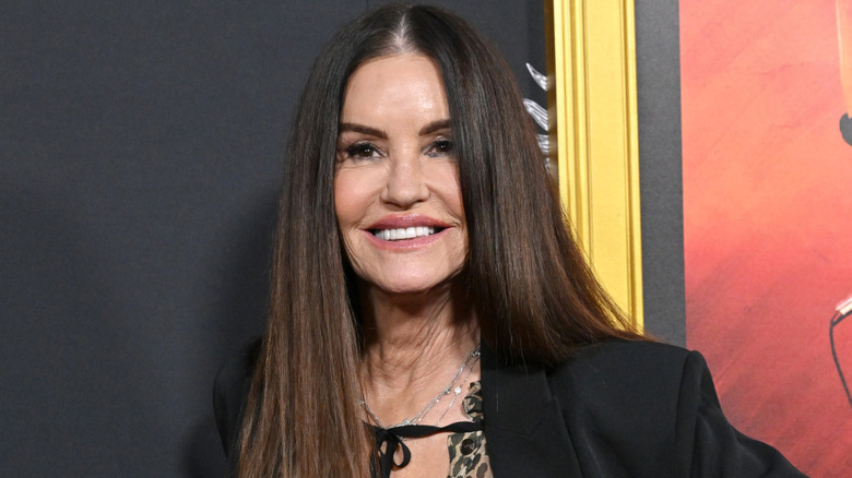 Janice Dickinson wearing a black blazer