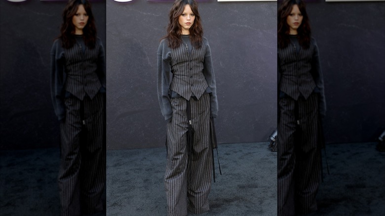 Jenna Ortega in a gray outfit