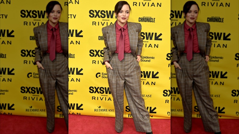 Jenna Ortega in a brown suit