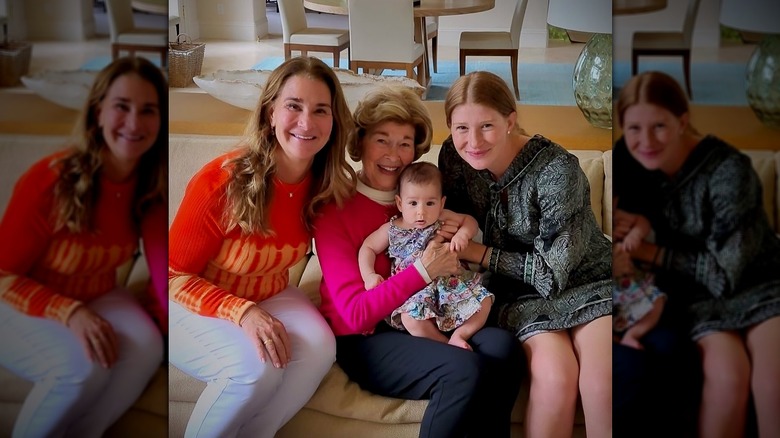 Jennifer Gates poses for a photo with her first daughter, her mother, and grandmother