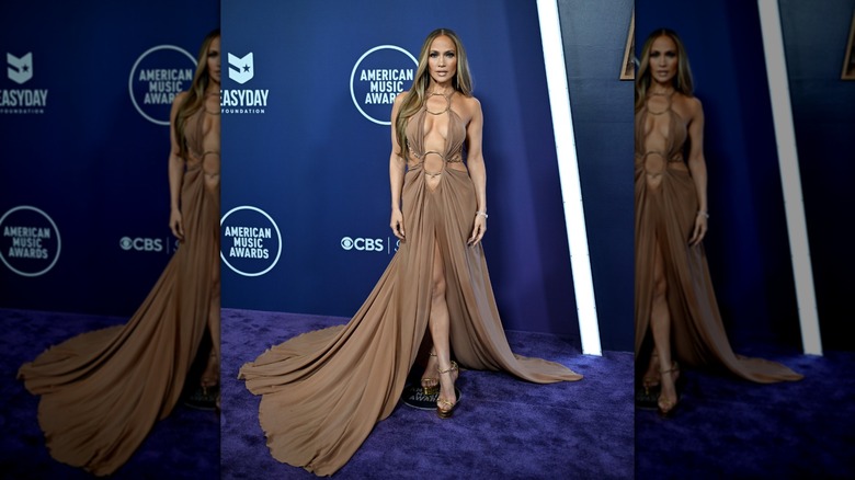 Jennifer Lopez at the 2025 American Music Awards, wearing a revealing, nude dress