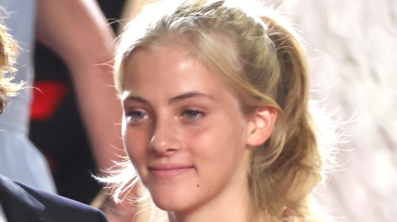 close up of Hazel Moder making her red carpet debut with a blond ponytail