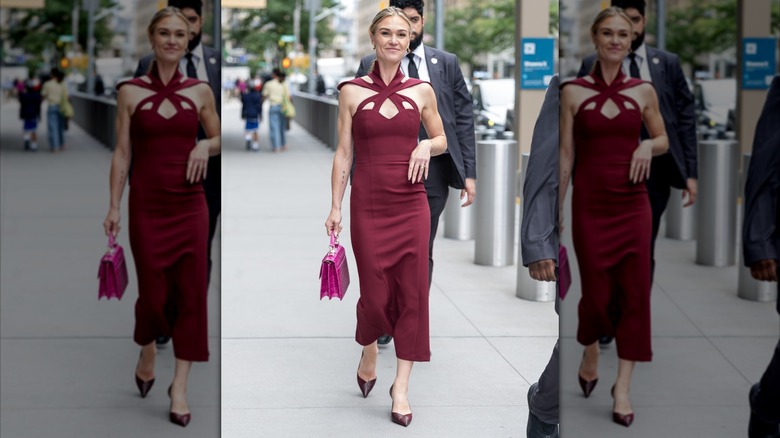 Julia Stiles wearing a strappy burgundy dress