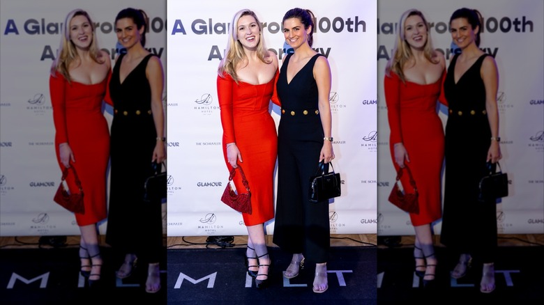 Olivia Nuzzi and Kaitlan Collins attend A Glamorous 100th Anniversary with Glamour and Hamilton Hotel on October 11, 2022 in Washington, DC