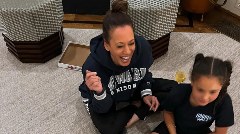 Kamala Harris alongside her great nieces playing Connect Four
