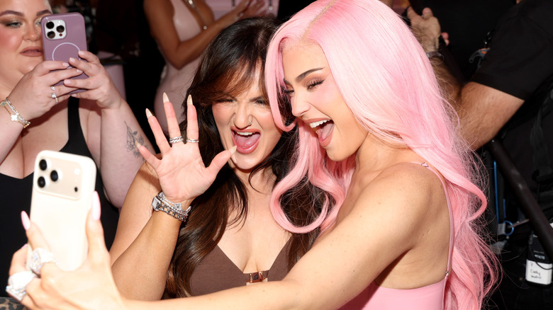 Mikayla Nogueira and Kylie Jenner posing for a selfie at a Kylie Cosmetics event