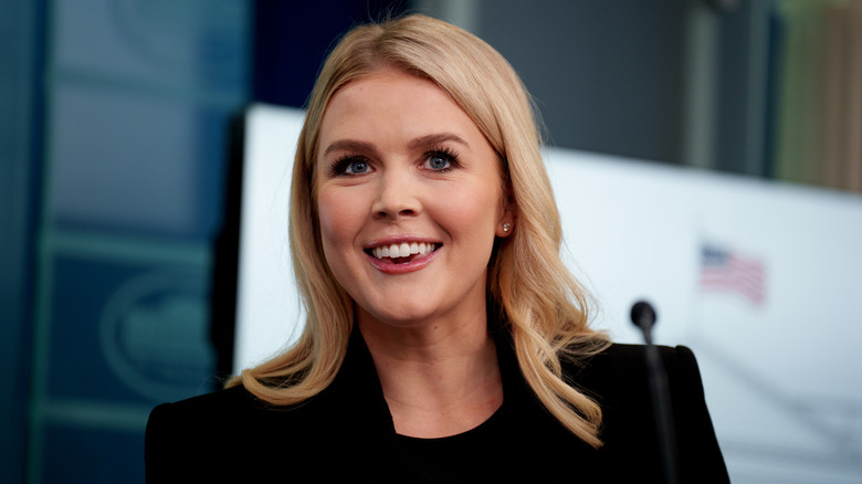 Karoline Leavitt at the White House in a black jacket
