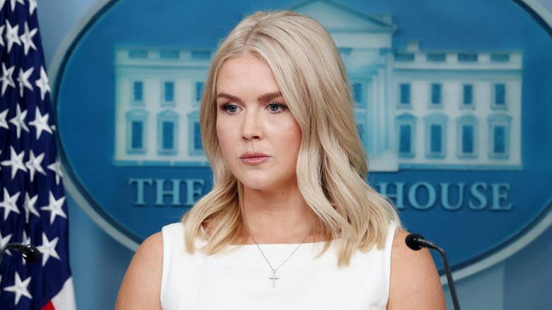 Karoline Leavitt with a neutral expression