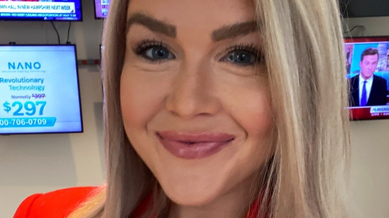 Karoline Leavitt with mascara in her eye